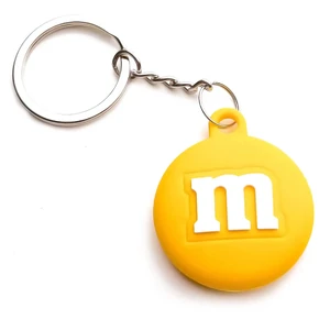 Силиконовый брелок с кольцом iLoungeMax Funny Cartoon Case M&M's Yellow для AirTag  - Фото 1